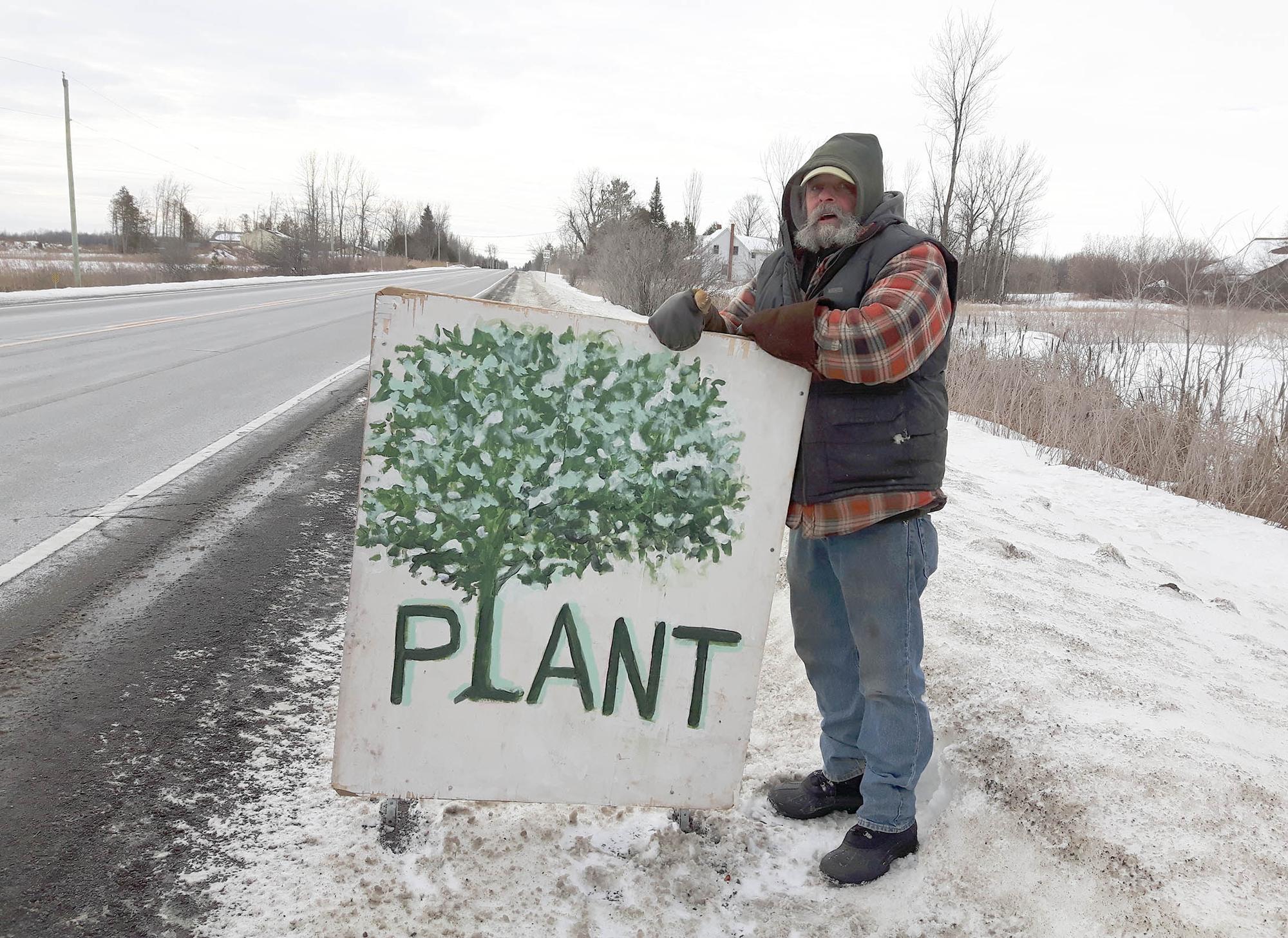 Andy Perreault still working to save trees
