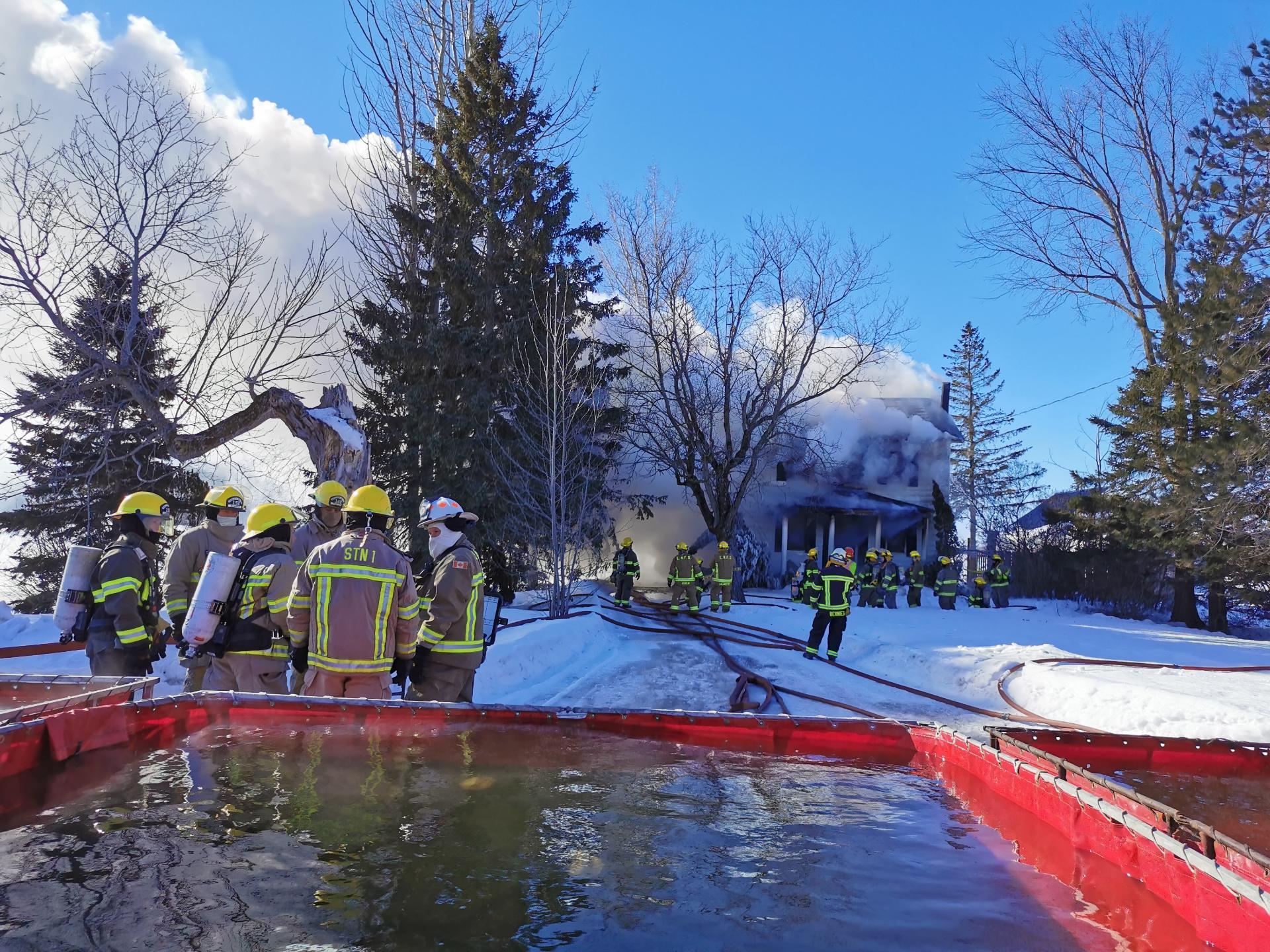 Wind and cold temperatures a challenge as firefighters battled Greenlane Road house fire