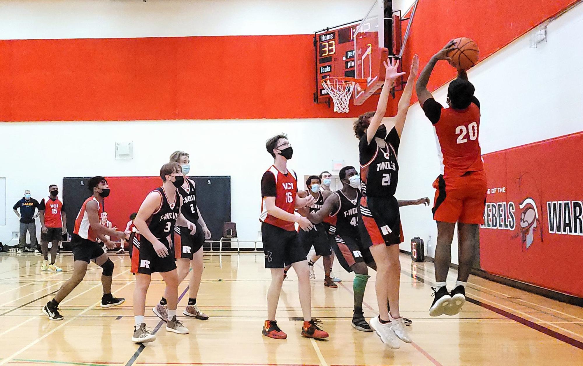 Russell T-Wolves top VCI Warriors 54-46 in Senior Boys basketball