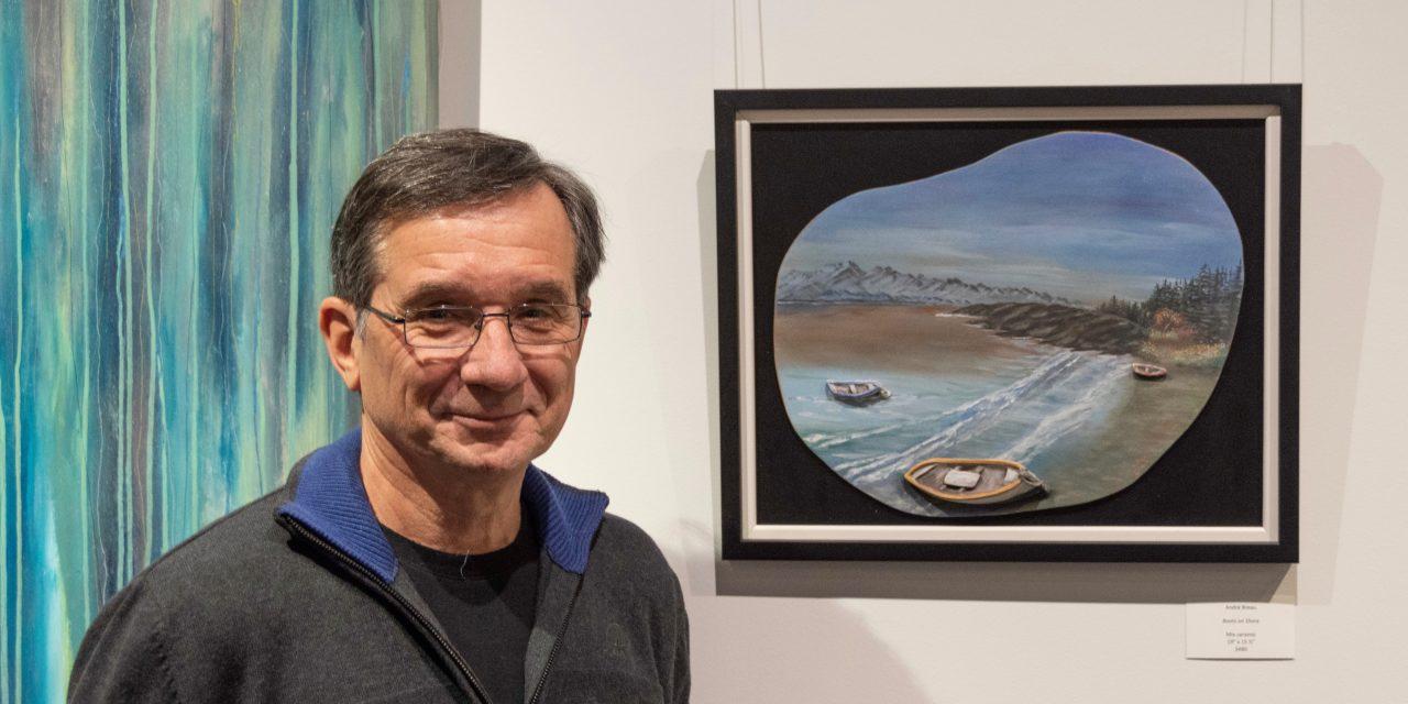 Sculptor molds the earth into art