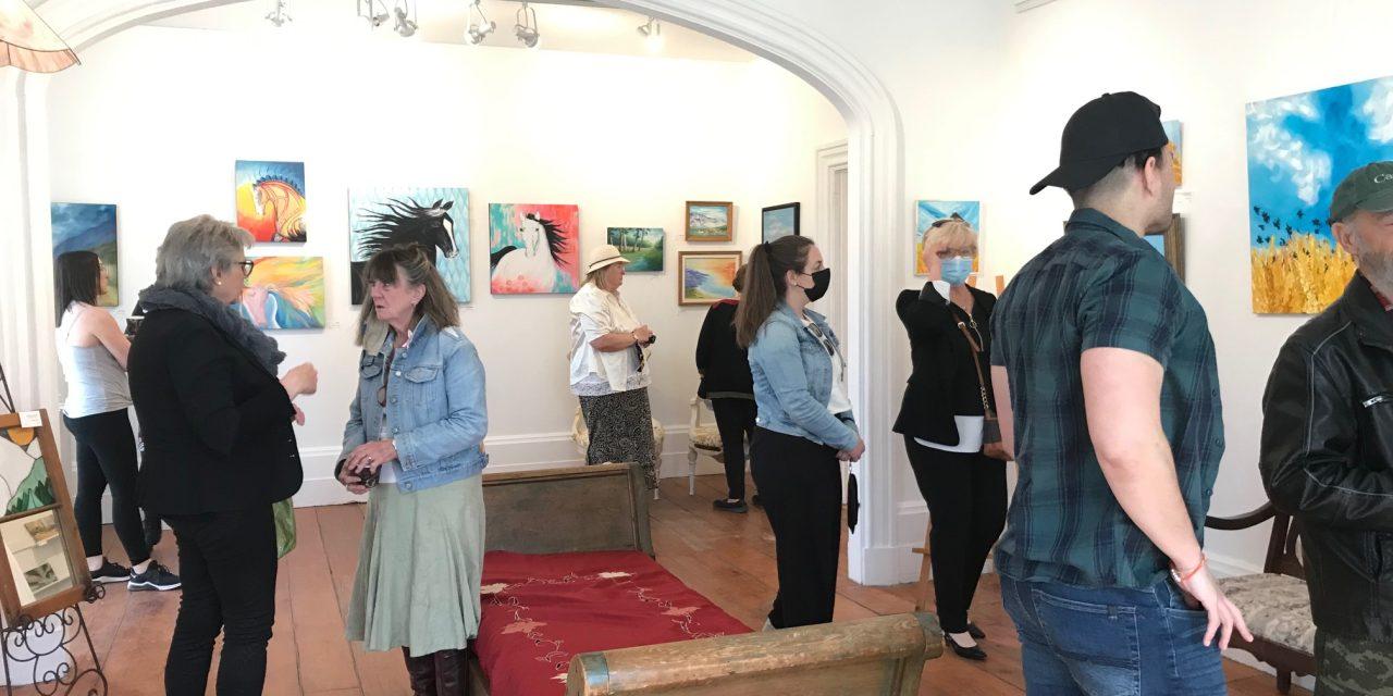 Vernissage a success for beloved local artists