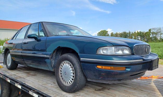 Son surprises father with demolition derby car