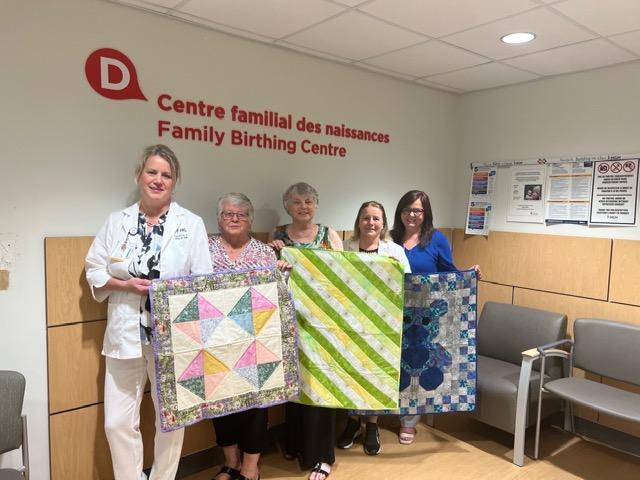 Quilts keep HGH newborns cozy