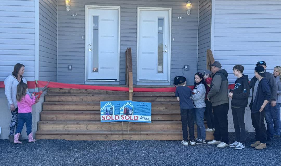 Families moving into new Habitat for Humanity homes in Maxville